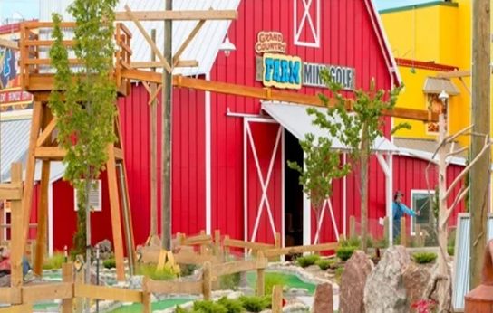The red barn at Grand Country’s Farm 18-Hole Mini-Golf