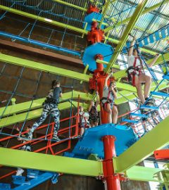 Guests on the multi-level ropes course