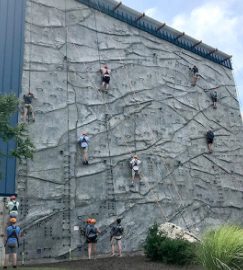 Climbers on the outdoor rock wall