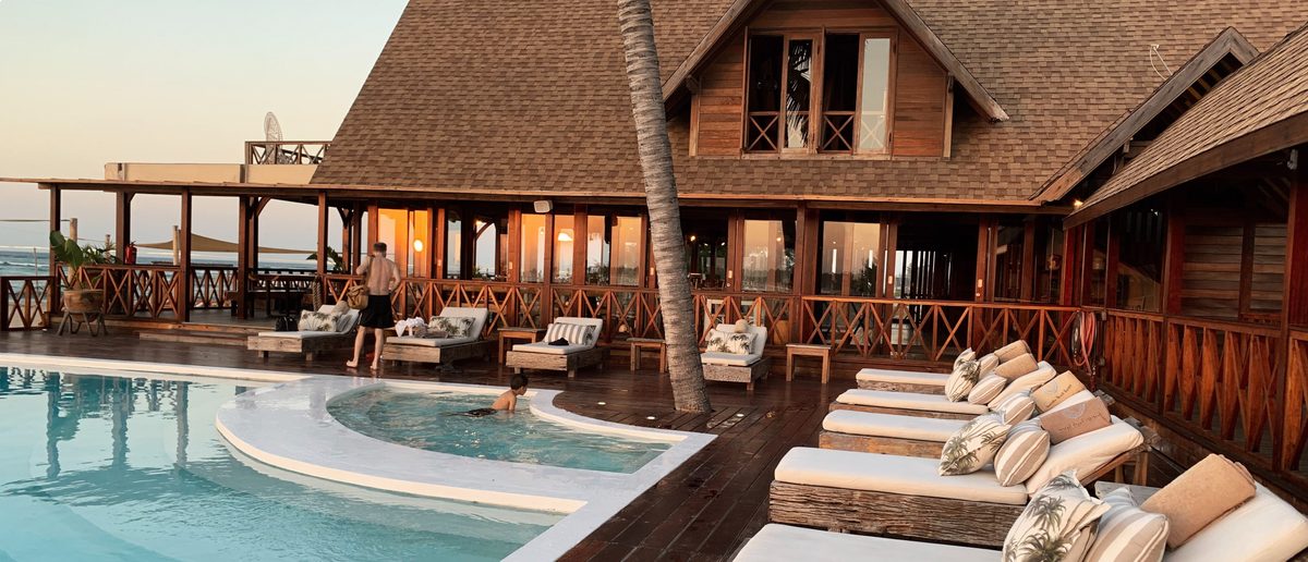 Resort pool deck at sunset
